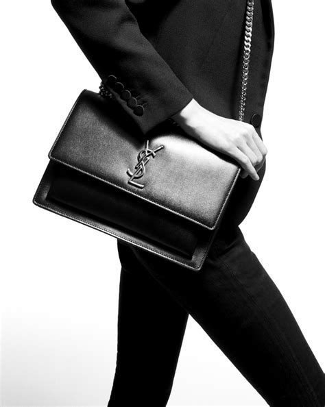 Saint Laurent Medium Sunset Leather Top Handle Bag.